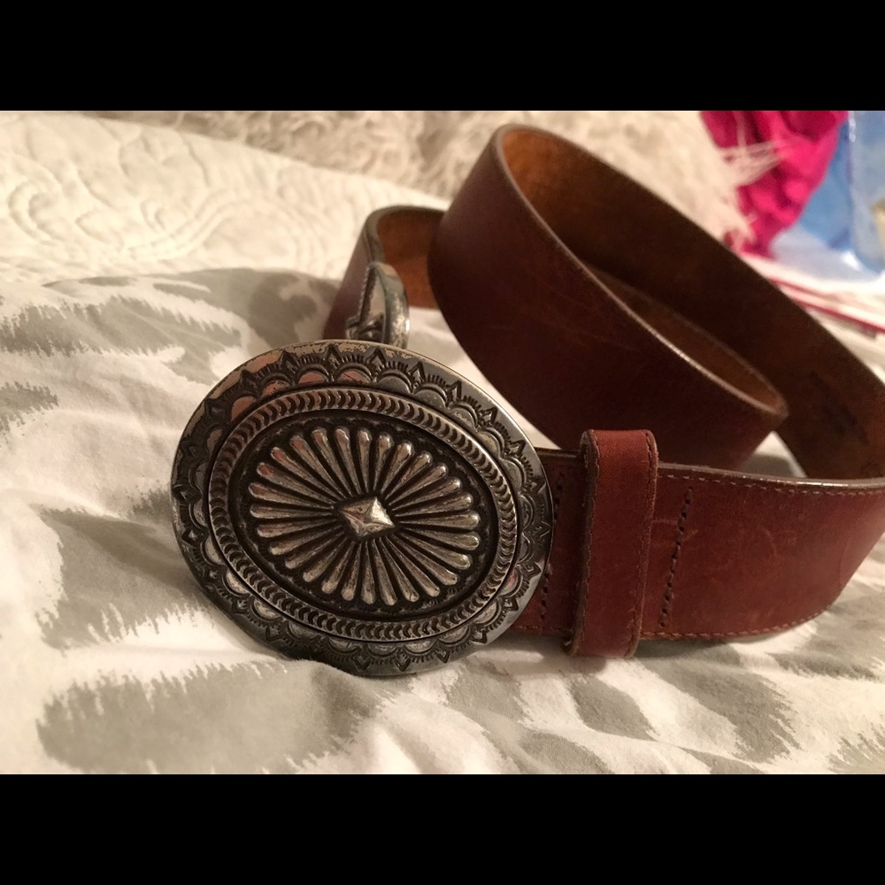 Brown belt with silver buckle